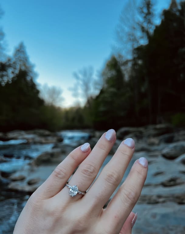 Oval diamond ring on hand