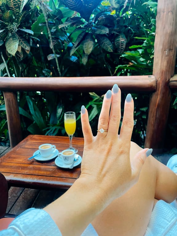 Oval diamond ring on hand