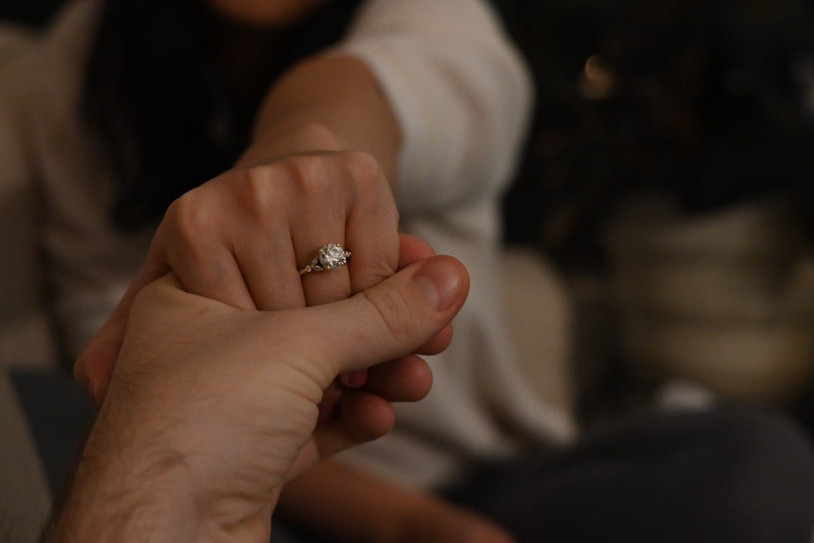Oval diamond ring on hand