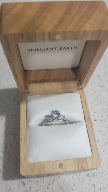 Oval diamond ring on hand