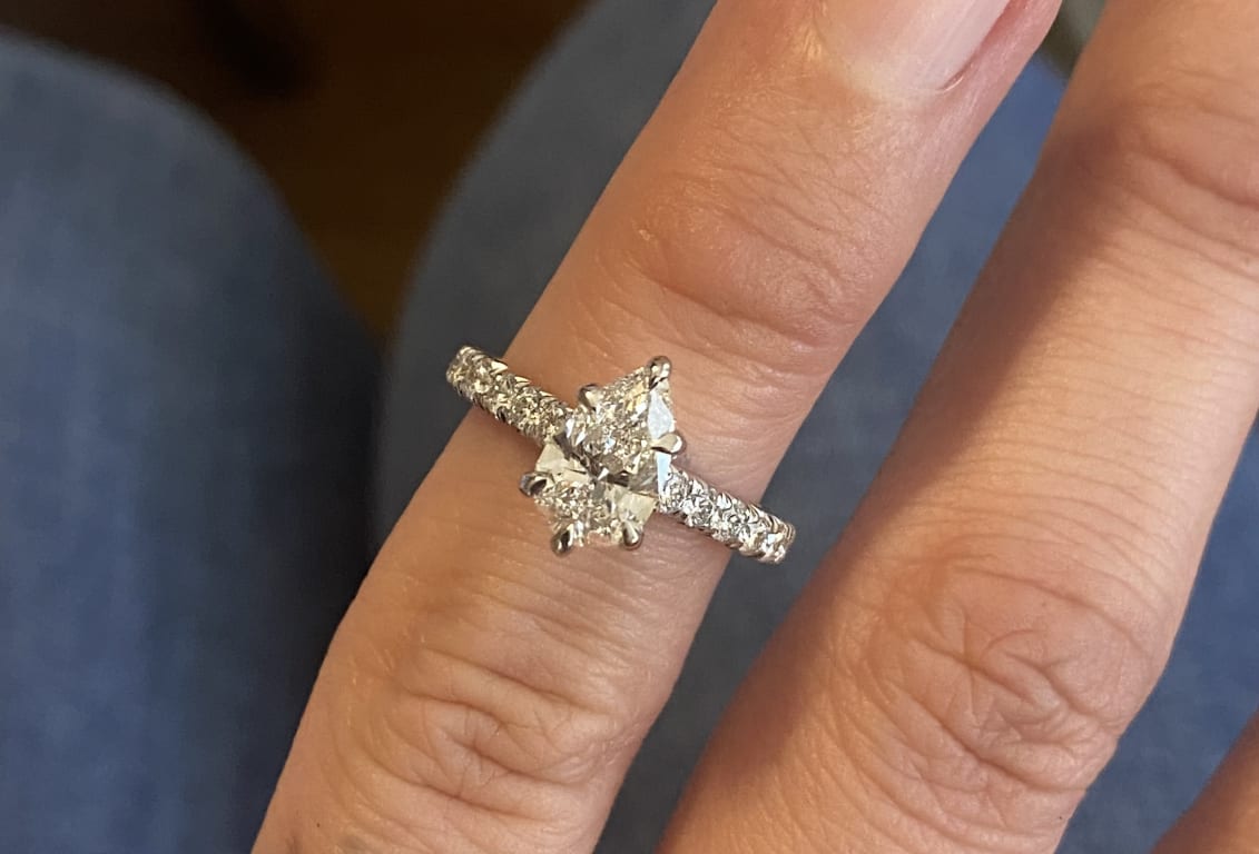 Oval diamond ring on hand
