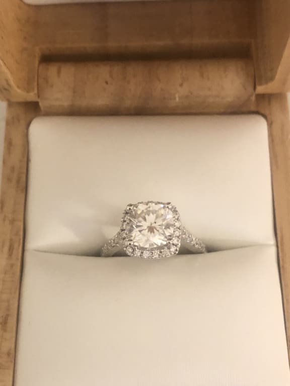 Oval diamond ring on hand