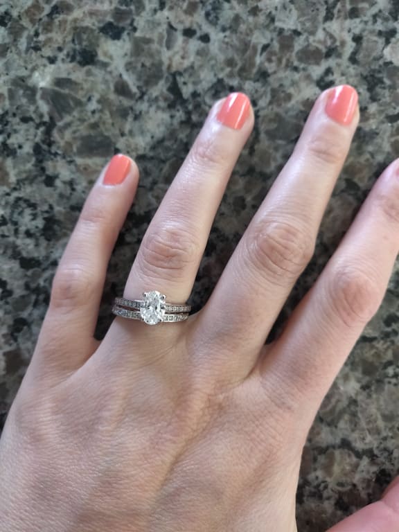 Oval diamond ring on hand