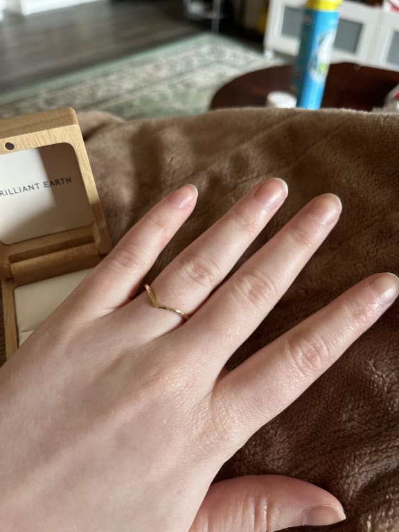 Oval diamond ring on hand