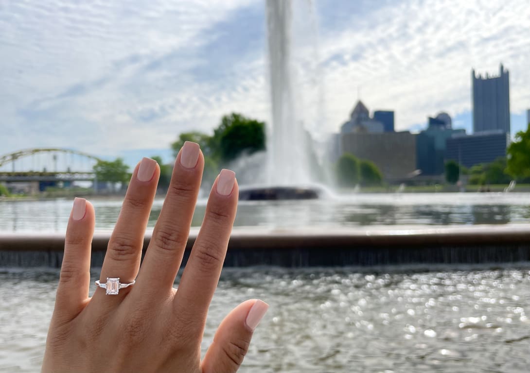 Oval diamond ring on hand