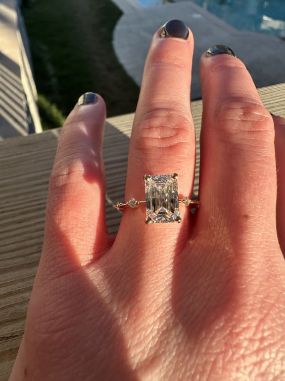Oval diamond ring on hand