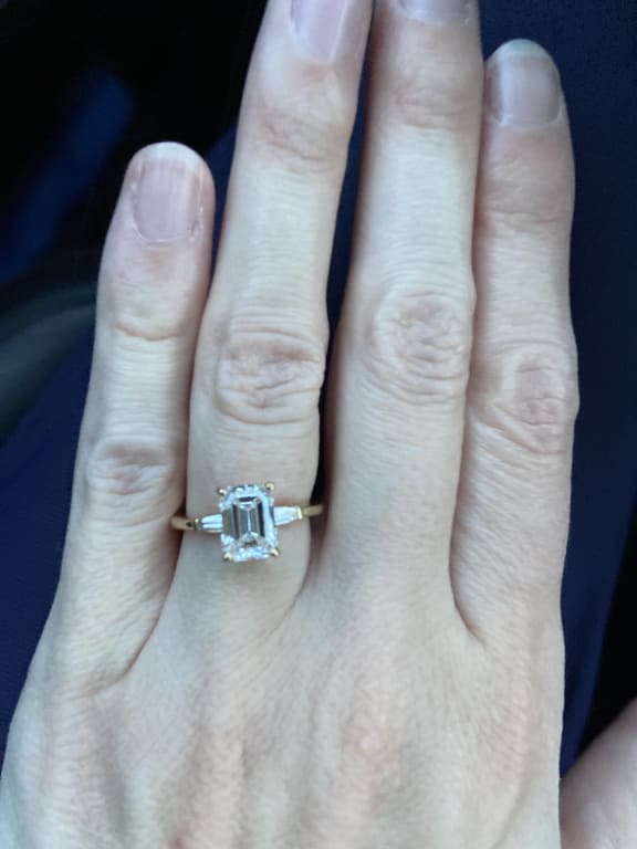 Oval diamond ring on hand