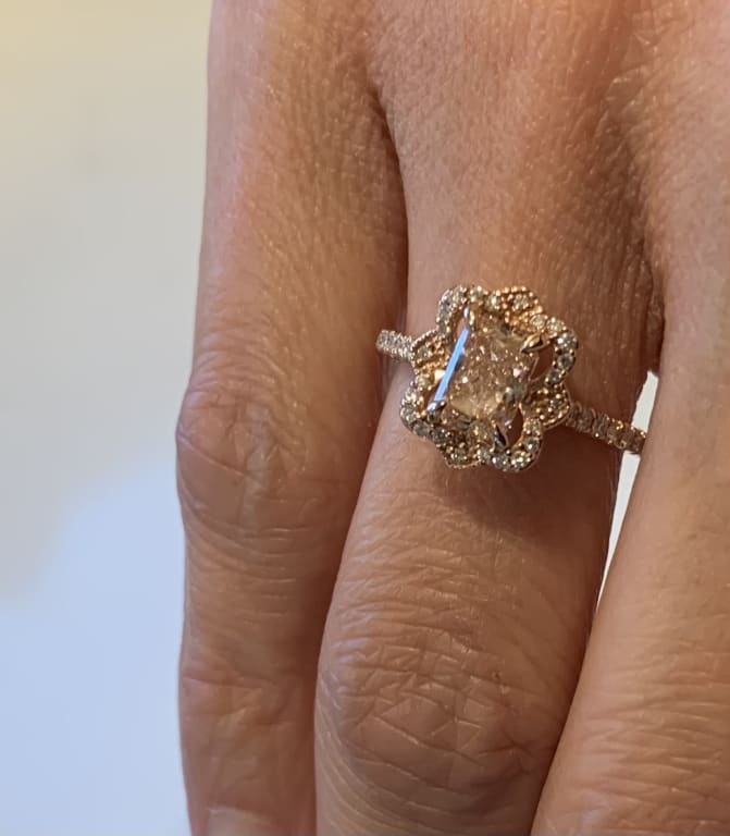 Oval diamond ring on hand
