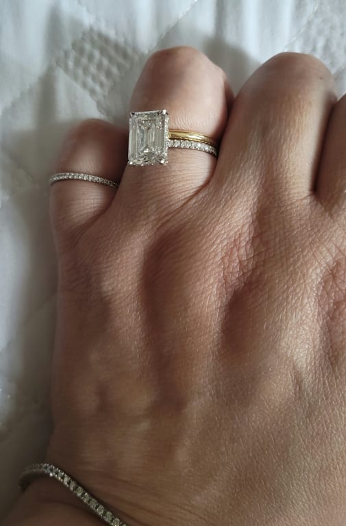Oval diamond ring on hand