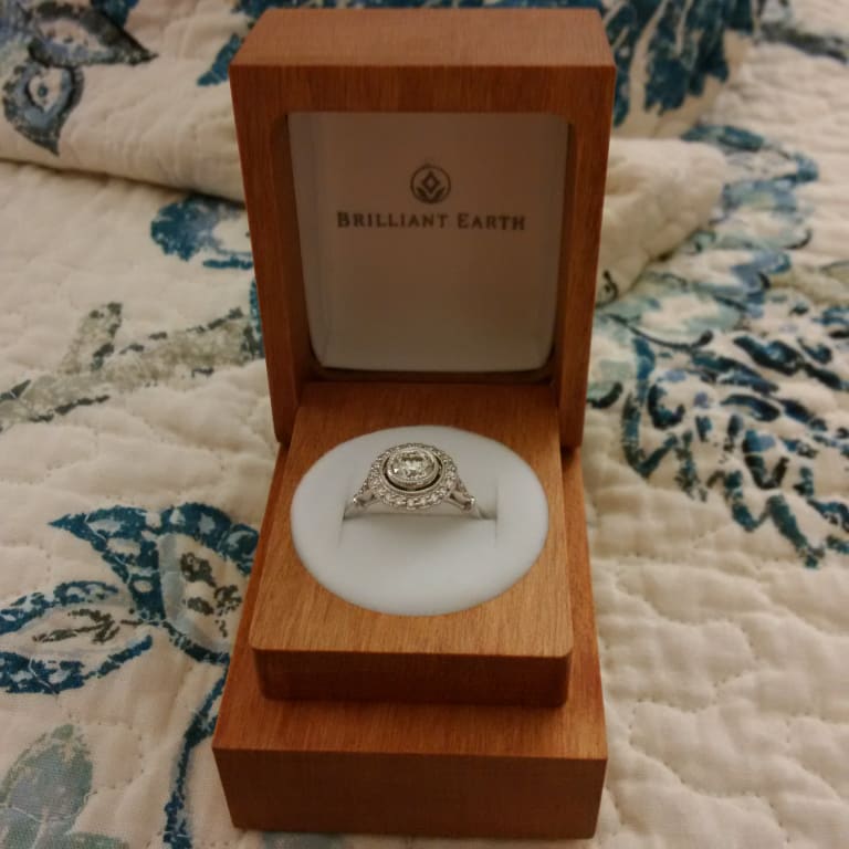 Oval diamond ring on hand