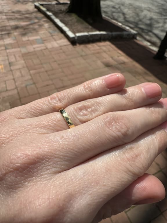 Oval diamond ring on hand
