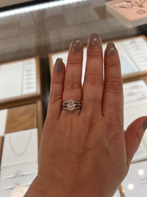 Oval diamond ring on hand