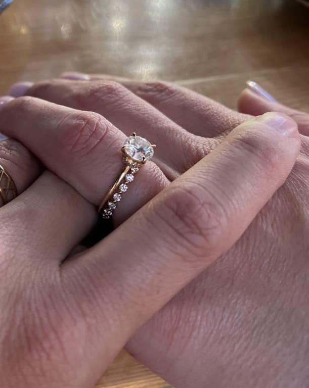 Oval diamond ring on hand