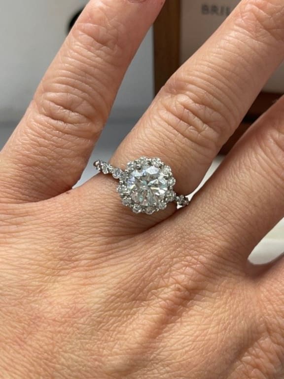 Oval diamond ring on hand