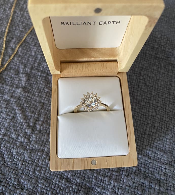 Oval diamond ring on hand