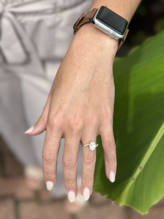 Oval diamond ring on hand