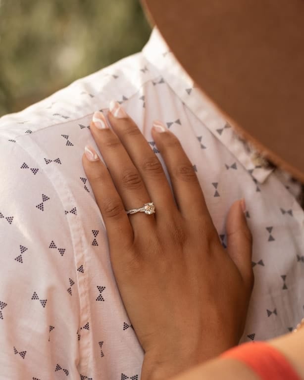 Oval diamond ring on hand