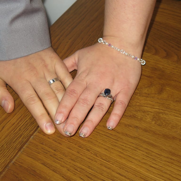 Oval diamond ring on hand
