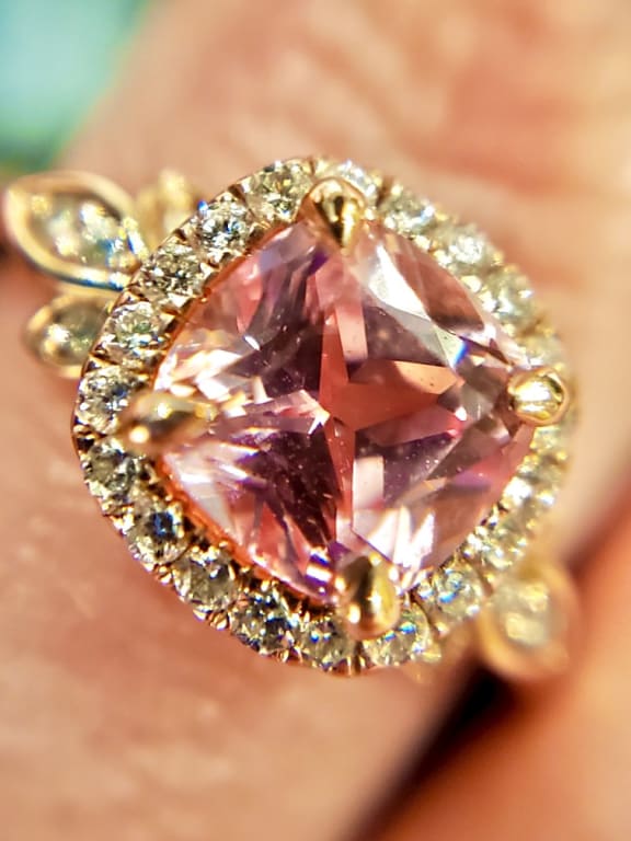 Oval diamond ring on hand
