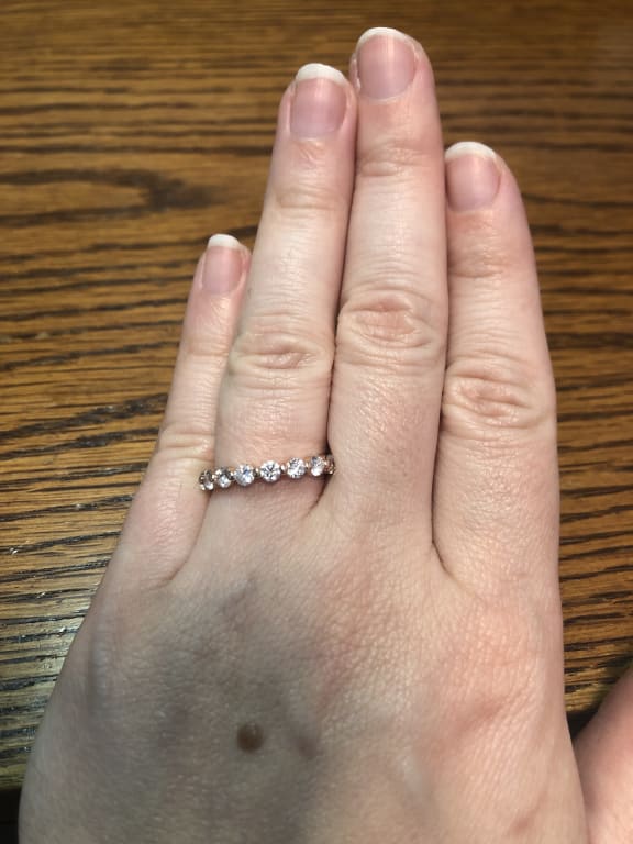 Oval diamond ring on hand