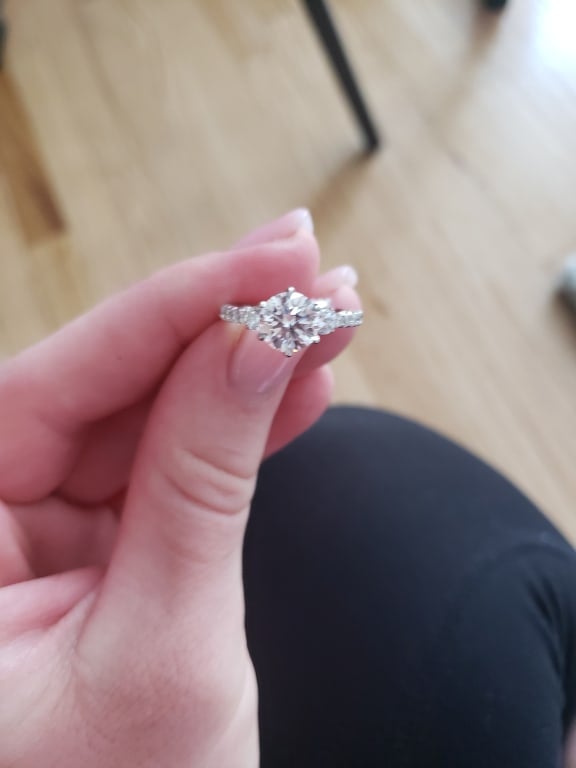 Oval diamond ring on hand