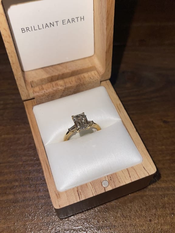 Oval diamond ring on hand