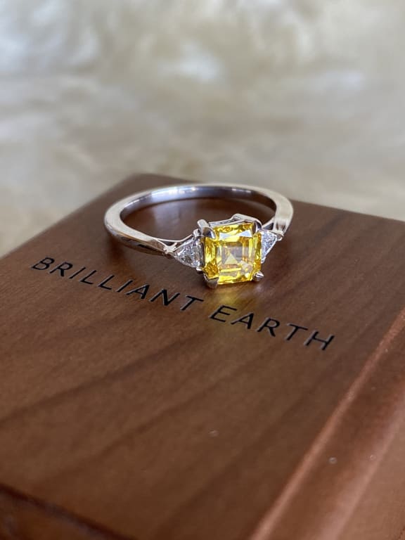 Oval diamond ring on hand
