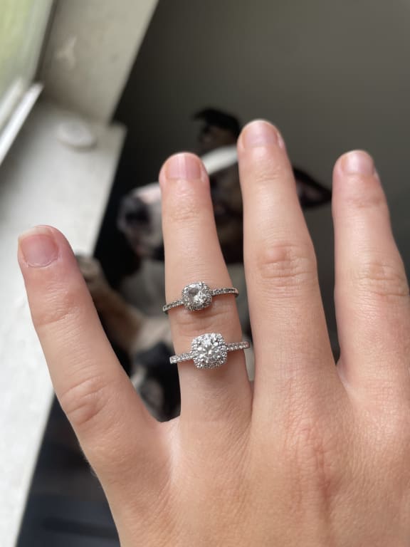 Oval diamond ring on hand