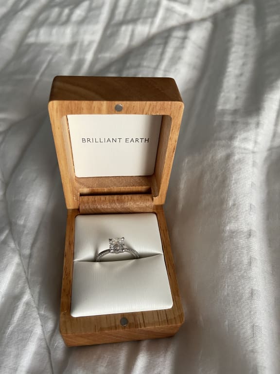 Oval diamond ring on hand