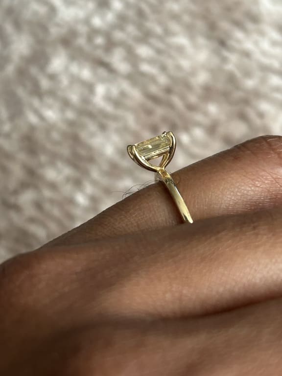 Oval diamond ring on hand