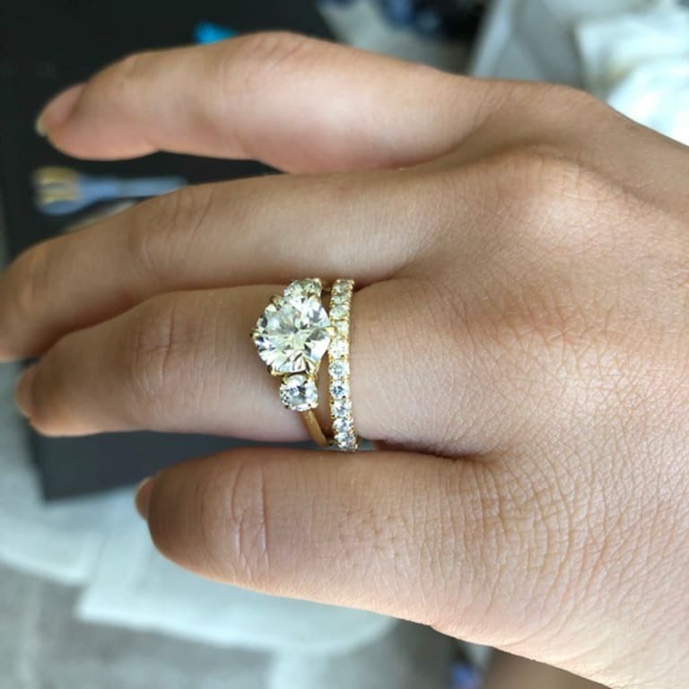 Oval diamond ring on hand