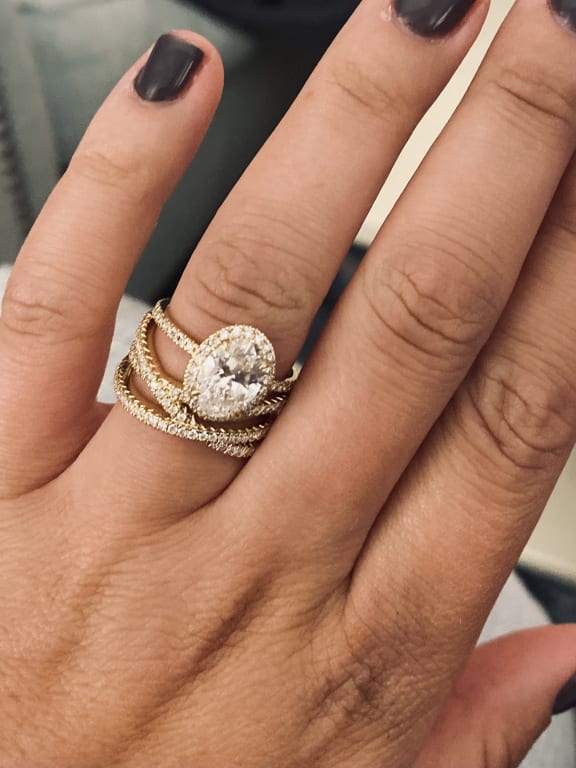 Oval diamond ring on hand