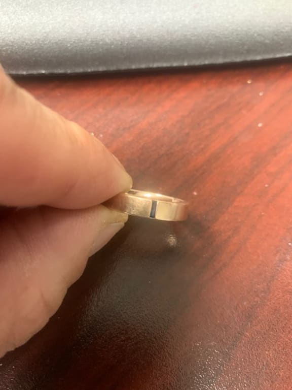 Oval diamond ring on hand