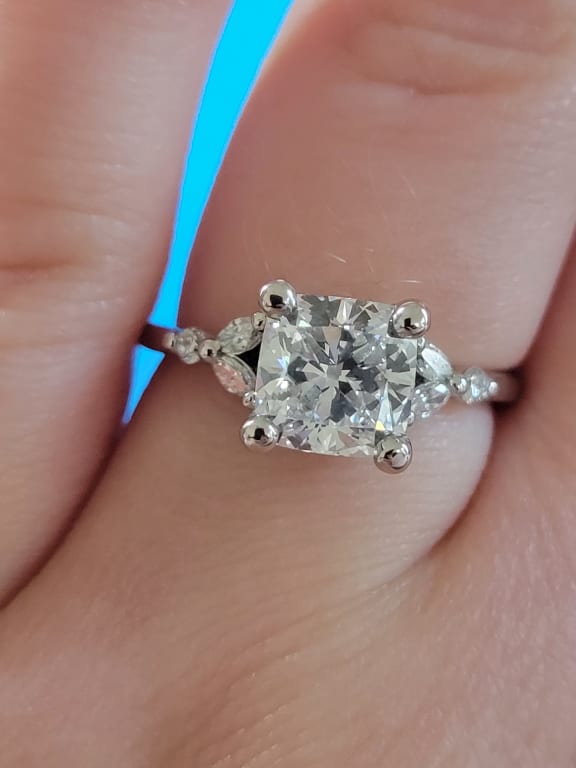 Oval diamond ring on hand