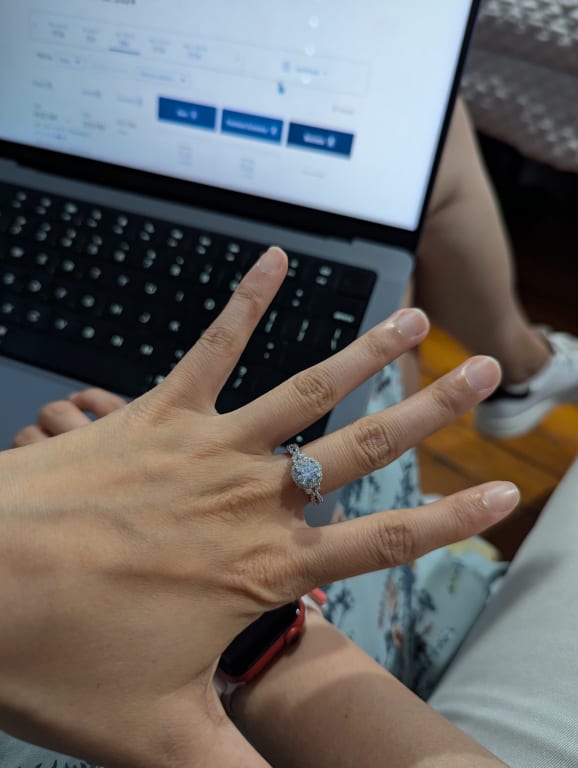 Oval diamond ring on hand
