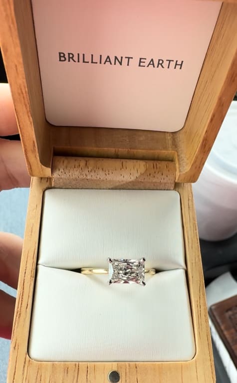 Oval diamond ring on hand
