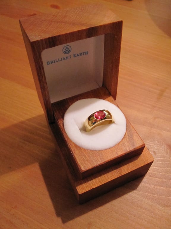 Oval diamond ring on hand