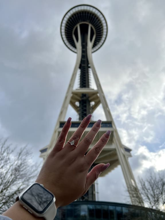 Oval diamond ring on hand