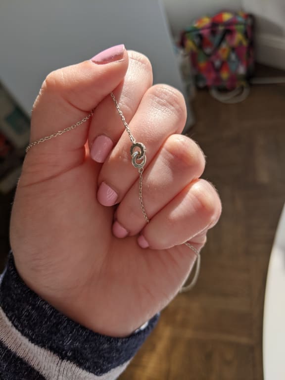 Oval diamond ring on hand