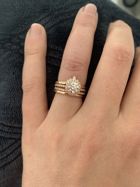 Oval diamond ring on hand
