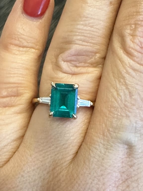 Oval diamond ring on hand