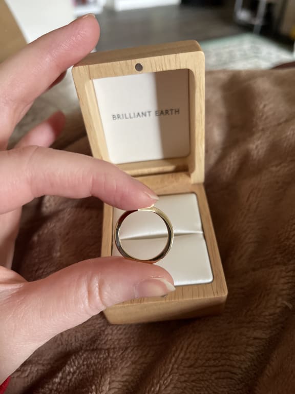 Oval diamond ring on hand