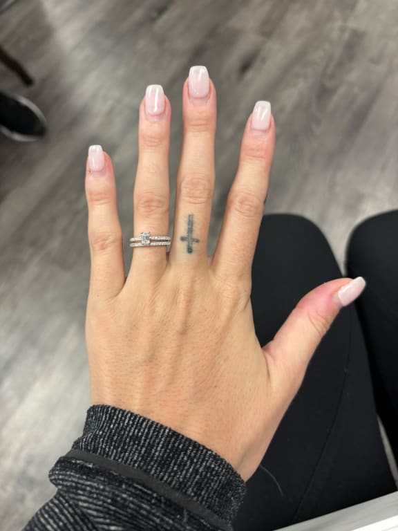 Oval diamond ring on hand