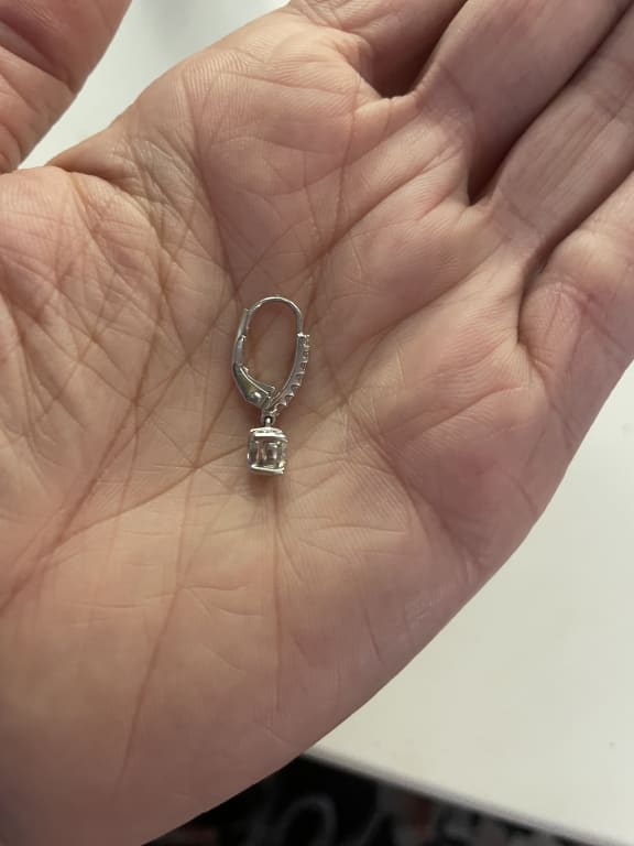 Oval diamond ring on hand