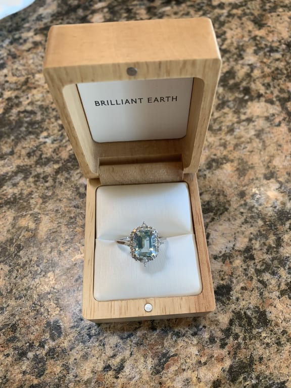 Oval diamond ring on hand