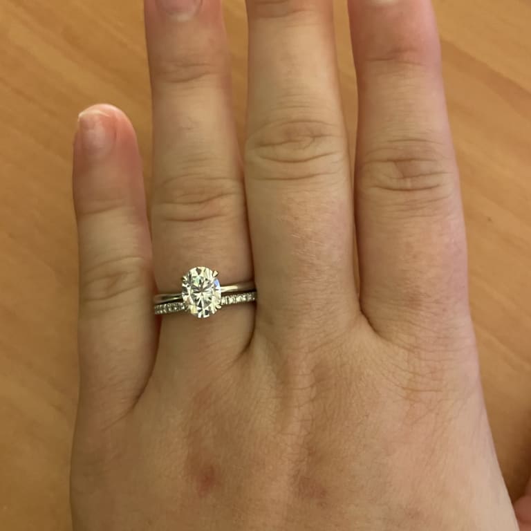 Oval diamond ring on hand