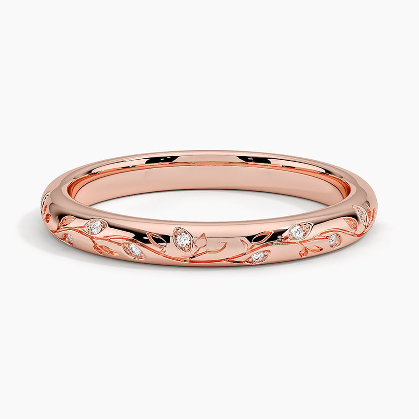 Rose gold diamond engagement ring with surprise diamond details