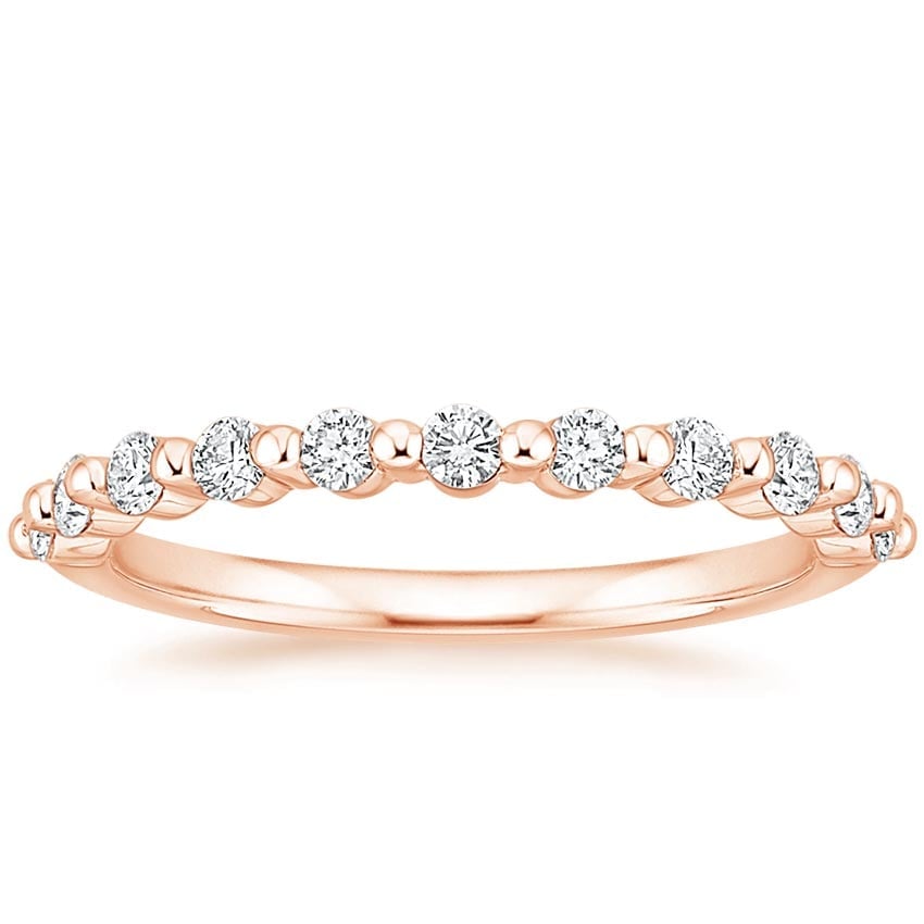 Rose gold diamond engagement ring with surprise diamond details