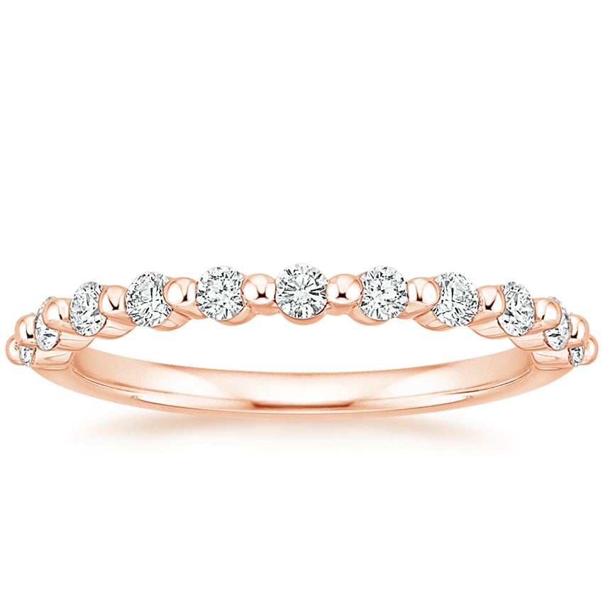 Rose gold diamond engagement ring with surprise diamond details