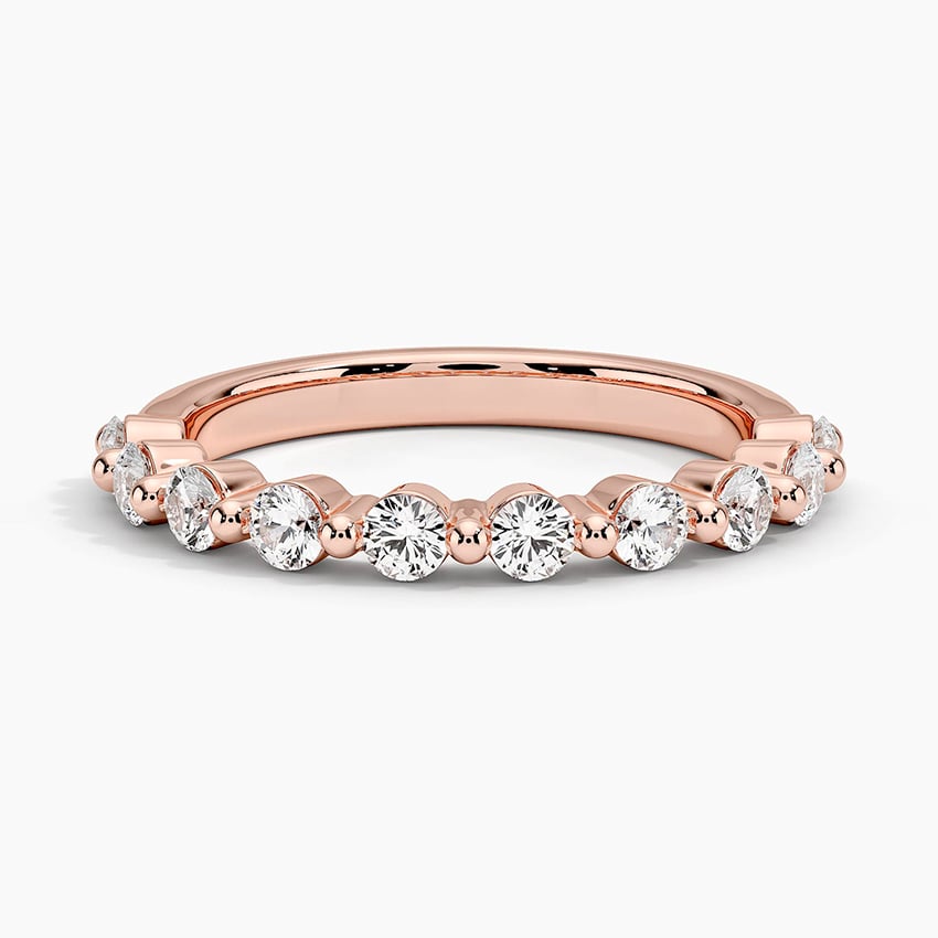 Rose gold diamond engagement ring with surprise diamond details